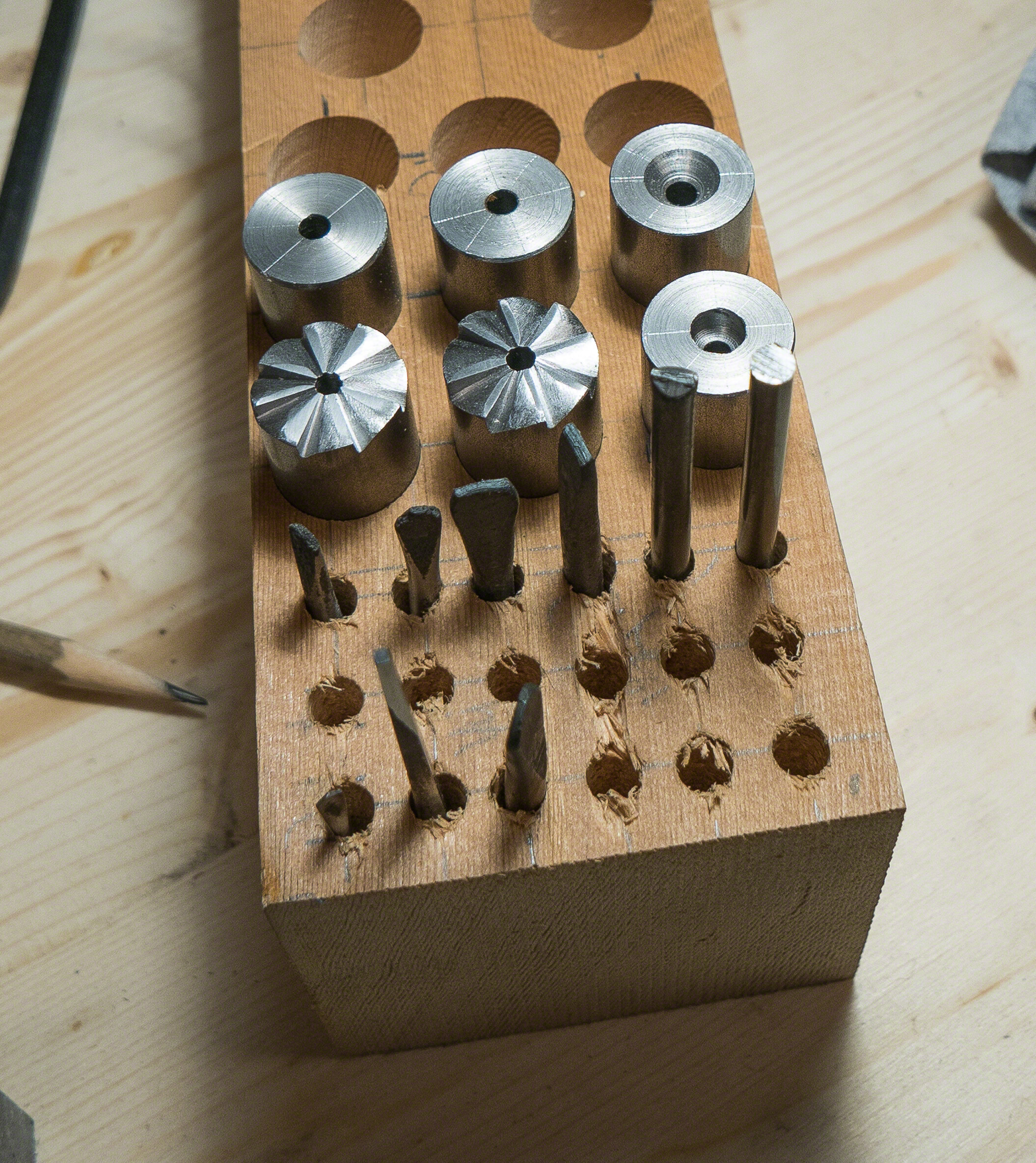 Screw mills, drill bits, reamers, and taps in progress for handmade lock project.