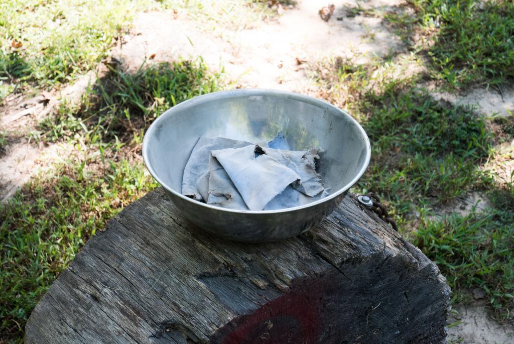 Charcoal bluing a barrel - rag and rottenstone to rub the hot barrel